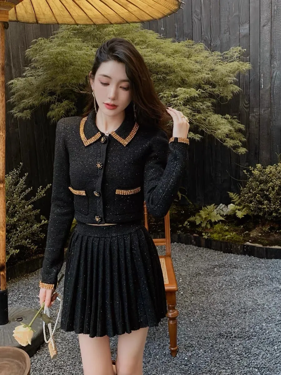 A complete set of tea-style outfits. Rich family's daughter, French style, black sequined knitted cardigan, pleated skirt suit