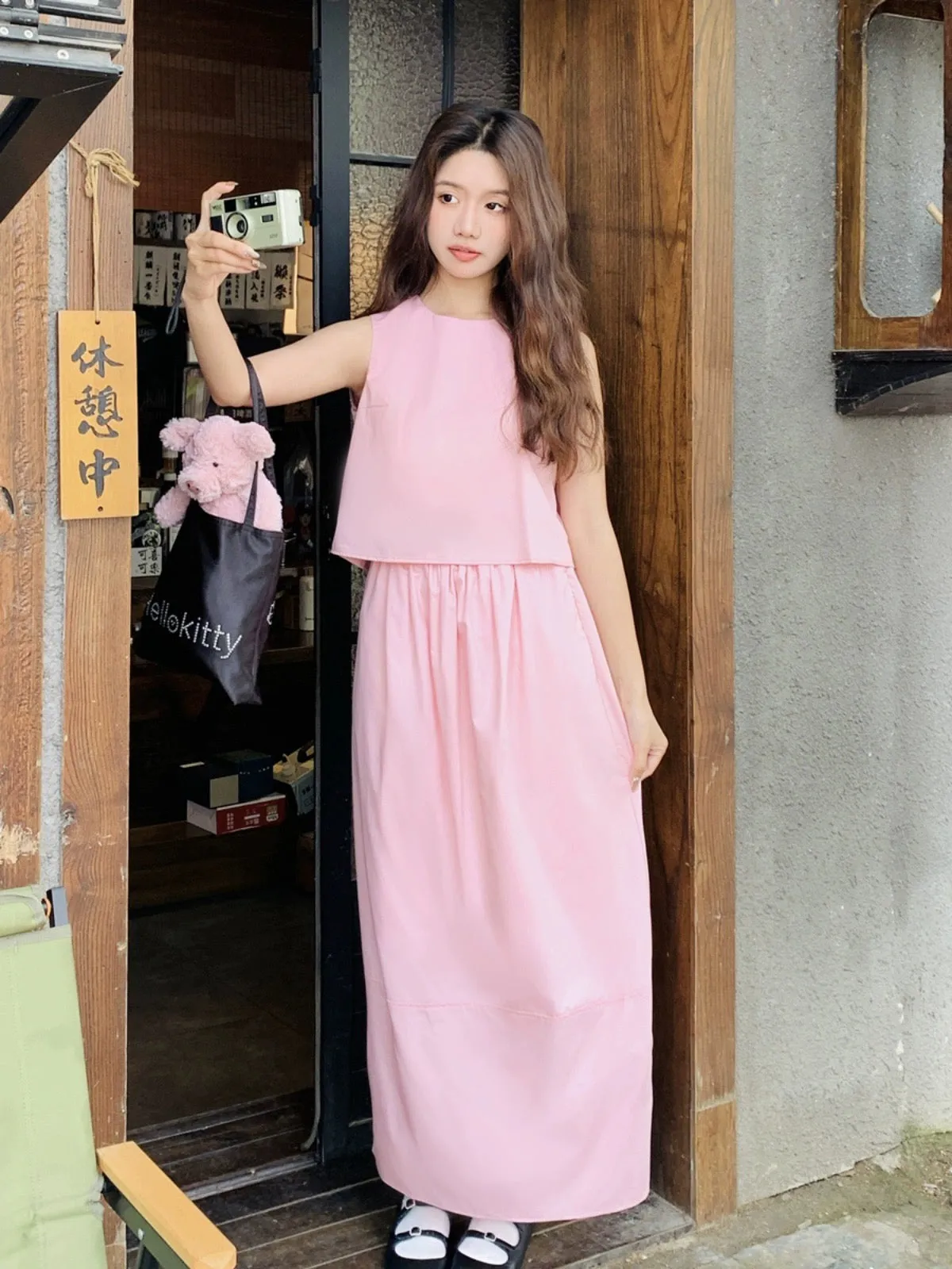 Pink sleeveless top suit summer women's 2024 new college style this year's popular age-reducing skirt two-piece set